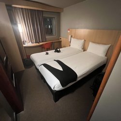 Hotel Ibis Heathrow - wide angle lens. The best part is that once you move those curtains to the left, it's just drywall. 100% of the window is visible here.