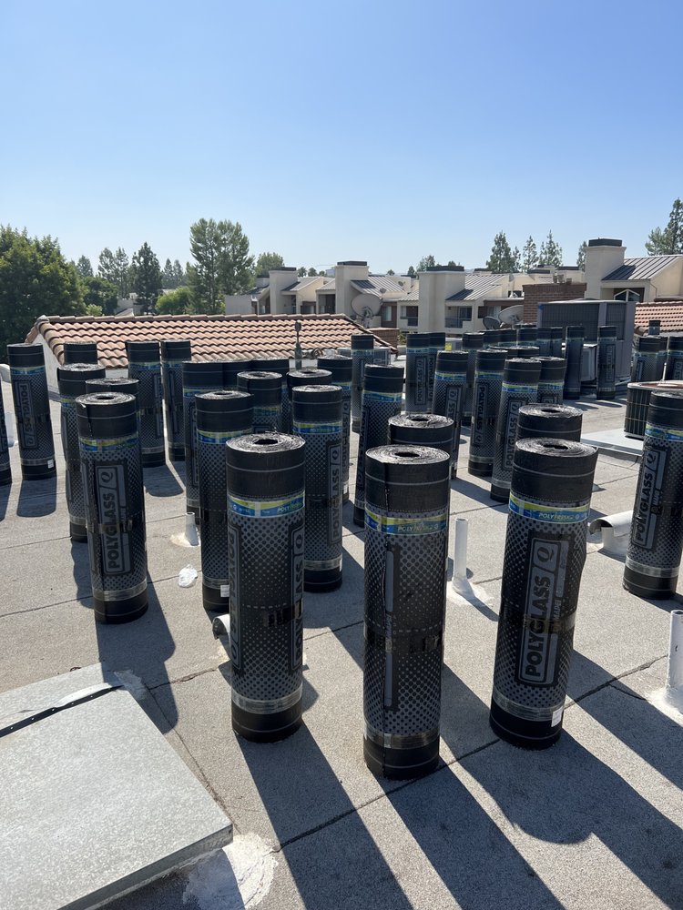 Slide of Green Ladder Roofing