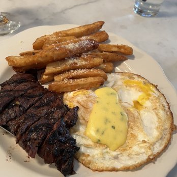 Siena Cafe - Ribeye Steak (12oz) with Parmesan Truffle Fries - Italian Near Me - New York, New York Siena Cafe - Ribeye Steak (12oz) with Parmesan Truffle Fries - Italian Near Me - New York, New York