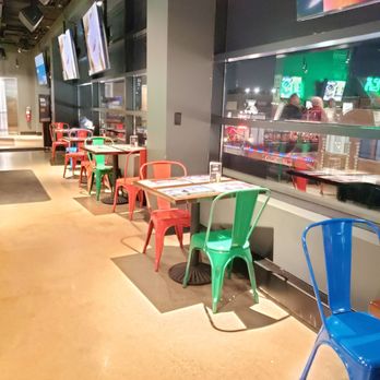 Alamo Drafthouse Cinema Wrigleyville - Small tables by the windows - Cinema Near Me - Chicago, Illinois Alamo Drafthouse Cinema Wrigleyville - Small tables by the windows - Cinema Near Me - Chicago, Illinois