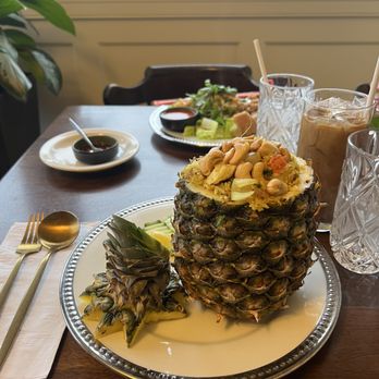 NaPha Thai Kitchen - Pineapple fried rice the cashews are great adds good texture and it is served in a whole pineapple - Thai Near Me - Middletown, Rhode Island