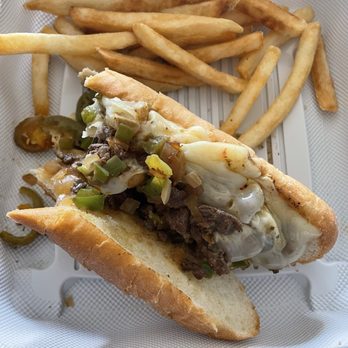 Karen's Little Cafe - Half of a Kicker Philly cheesesteak - Cafes Near Me - Lincoln, California Karen's Little Cafe - Half of a Kicker Philly cheesesteak - Cafes Near Me - Lincoln, California