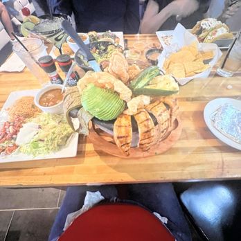 Tequilas D Oro - Molcajete with the goodies on the side. The dish stayed hot the entire time! - Mexican Near Me - Jacksonville, Florida Tequilas D Oro - Molcajete with the goodies on the side. The dish stayed hot the entire time! - Mexican Near Me - Jacksonville, Florida