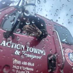 Action Towing - This is him blocking my lane and telling me to back up while flipping me off.  Action Towing is garbage!