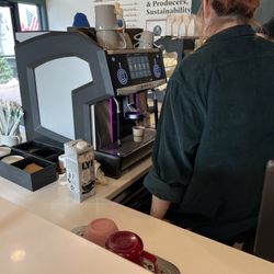 Woodland Baking & Coffee - Barista is hobbled by a terrible coffee vending machine that spits out awful espresso.