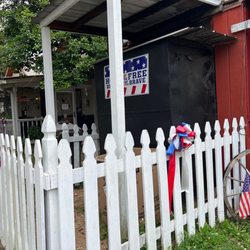 Mac's Barbeque - BBQ booth and in the back is their front porch you can eat from.