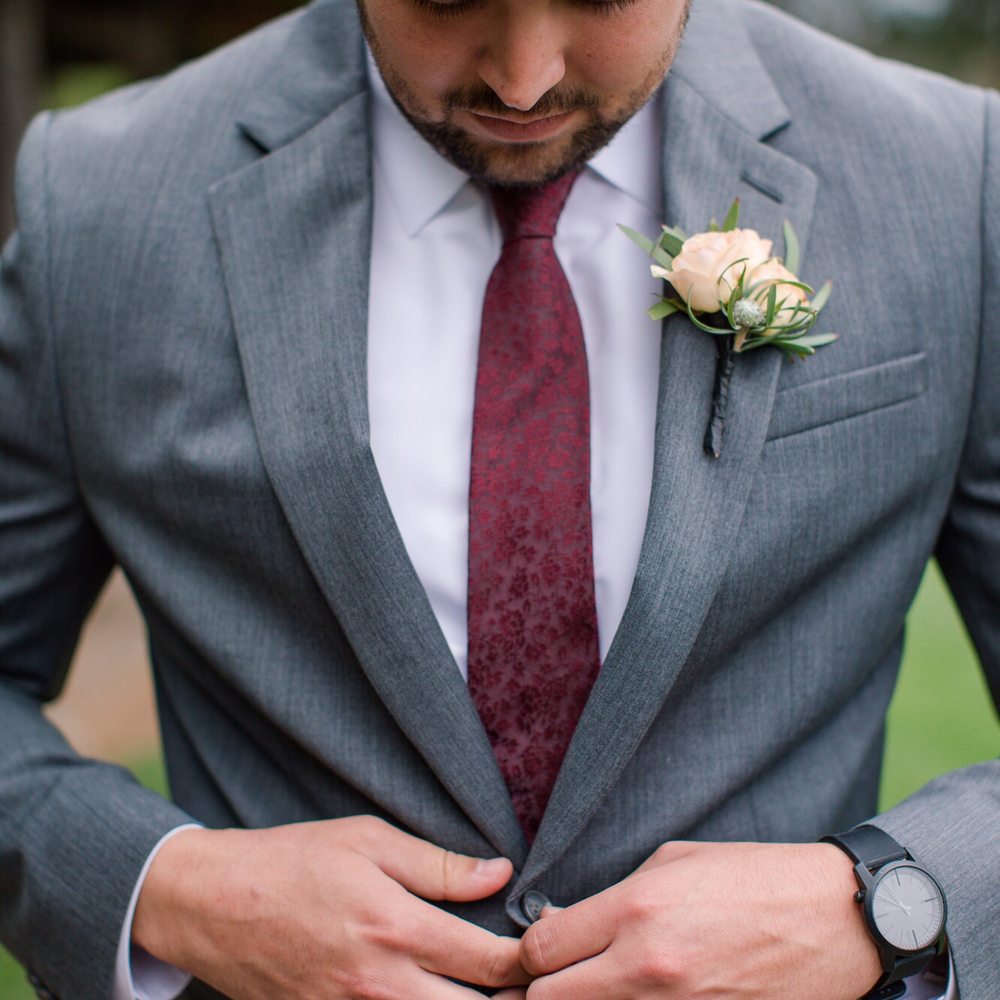 Simply Adina Floral Design - The groom's boutonnière to compliment the bride's bold colors. - Event Planning & Services Near Me Simply Adina Floral Design - The groom's boutonnière to compliment the bride's bold colors. - Event Planning & Services Near Me