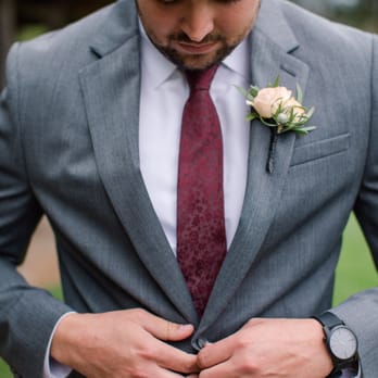 Simply Adina Floral Design - The groom's boutonnière to compliment the bride's bold colors. - Event Planning & Services Near Me
