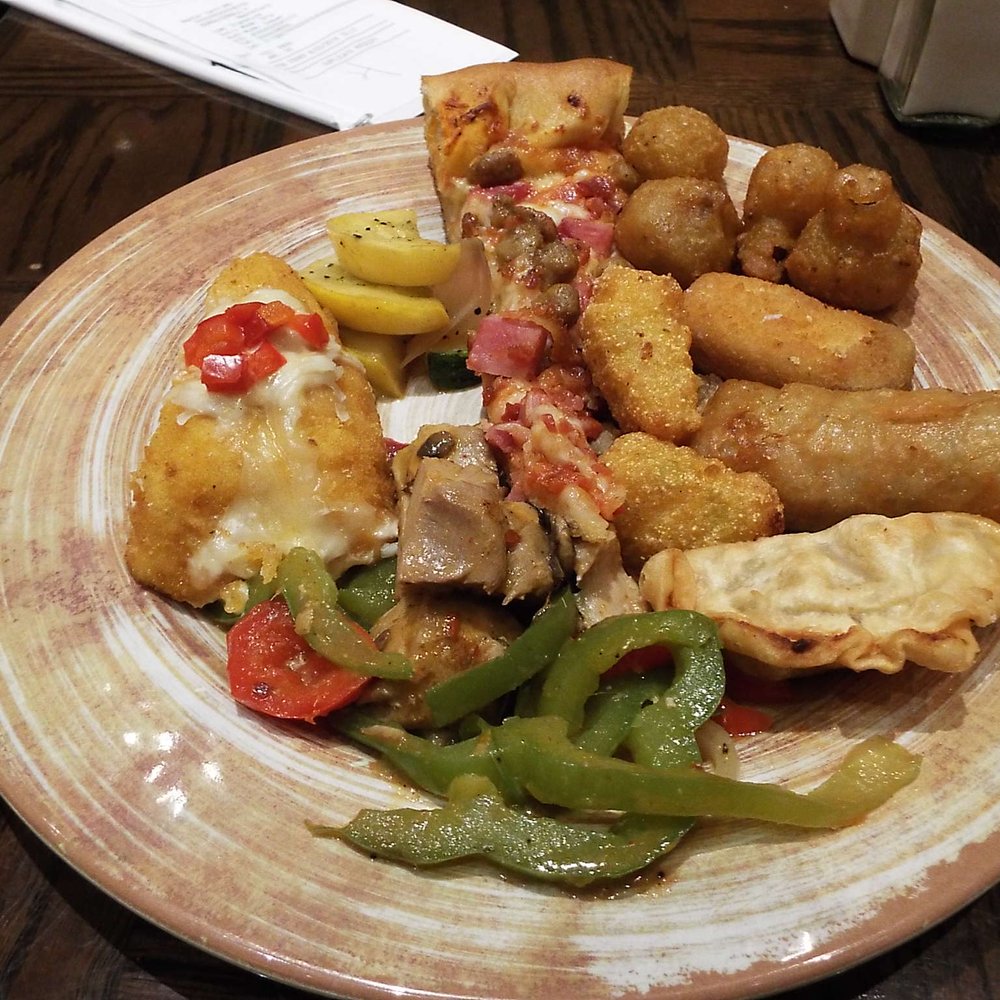 Gran Via Buffet - Clockwise: pizza, mushrooms, stuffed jalapenos, egg roll, pot sticker, Thai chicken, Chick Cordon Bleu and grilled veggies. - Buffets Near Me - Thackerville, Oklahoma Gran Via Buffet - Clockwise: pizza, mushrooms, stuffed jalapenos, egg roll, pot sticker, Thai chicken, Chick Cordon Bleu and grilled veggies. - Buffets Near Me - Thackerville, Oklahoma