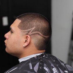 Xclusiv Barber Lounge - All even length with custom design.