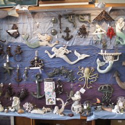 Blue Dolphin Antiques & Collectables - We have coastal décor including mermaids!