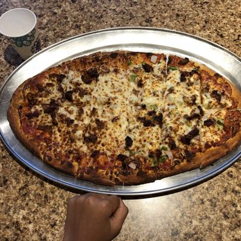 Football Pizza - My hand vs the MEDIUM pizza! - Pizza Near Me - Minneapolis, Minnesota Football Pizza - My hand vs the MEDIUM pizza! - Pizza Near Me - Minneapolis, Minnesota
