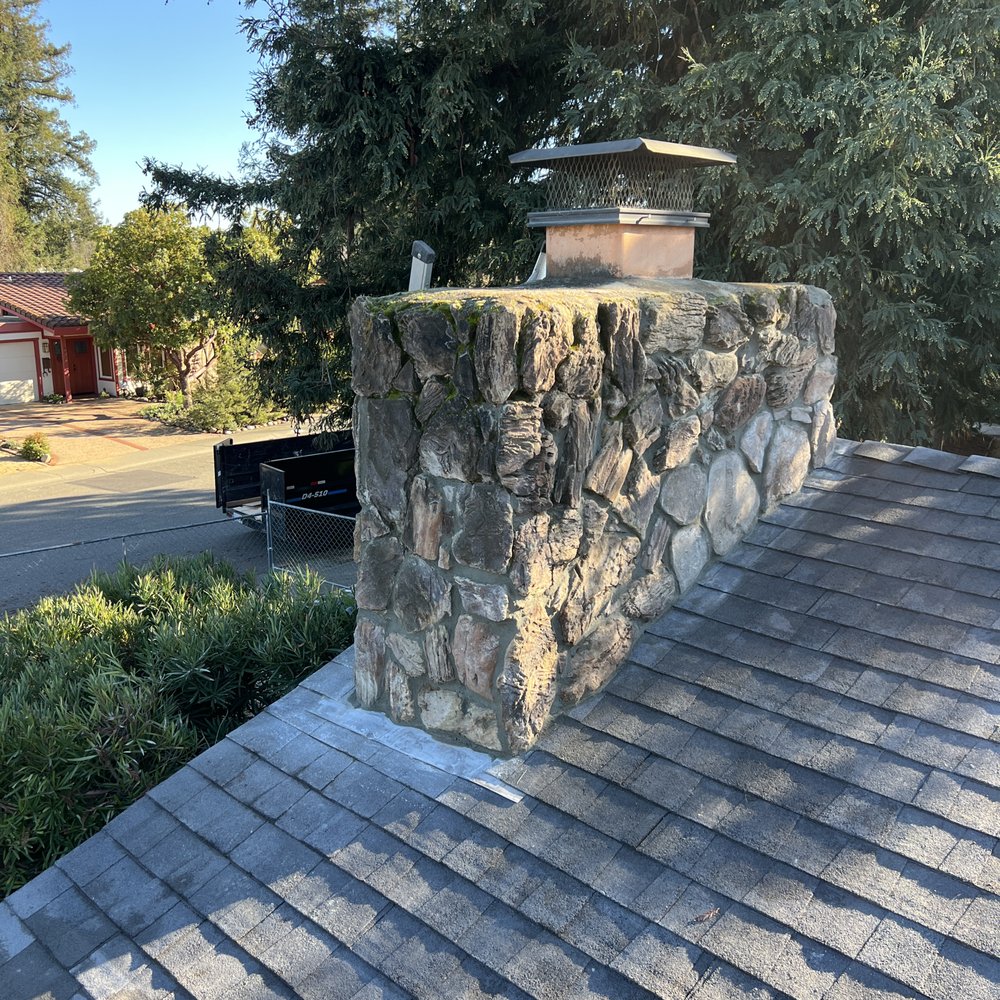 Nick Lambdin Masonry - backside of the chimney, new rock carefully selected to puzzle piece fit with the old 1969 chimney - Masonry/Concrete Near Me Nick Lambdin Masonry - backside of the chimney, new rock carefully selected to puzzle piece fit with the old 1969 chimney - Masonry/Concrete Near Me