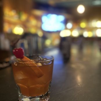 Chartres House - a drink in a glass on a bar - Beer Bar Near Me - New Orleans, Louisiana