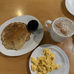 Silver Llama Market & Eatery - I got 1 blueberry pancake & 1 regular pancake. & 2 eggs with a chai latte
