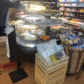 Caravia Fresh Foods - a woman standing in front of a deli counter - Sandwiches Near Me - Clarks Summit, Pennsylvania Caravia Fresh Foods - a woman standing in front of a deli counter - Sandwiches Near Me - Clarks Summit, Pennsylvania