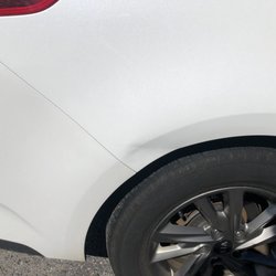 Budget Car & Truck Rental - Rear dent