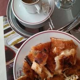 Turkish coffee and fresh börek with cheese