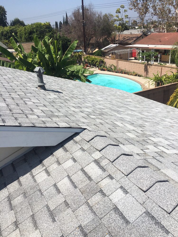 Slide of Thompson Roofing