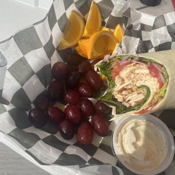 The Hibiscus Jerk Hut - Half of my Jerk Chicken Caesar Wrap - Caribbean Near Me - Springfield, Missouri The Hibiscus Jerk Hut - Half of my Jerk Chicken Caesar Wrap - Caribbean Near Me - Springfield, Missouri