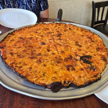 T J's Pizzeria & Catering - Beautiful ring of caramelized cheese around the edge. Fantastic! - Pizza Near Me - Parlin, New Jersey T J's Pizzeria & Catering - Beautiful ring of caramelized cheese around the edge. Fantastic! - Pizza Near Me - Parlin, New Jersey