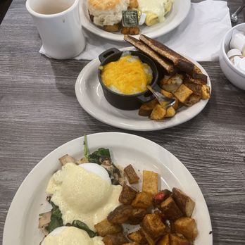 Fork and Spoon - Jullian Eggs Benedict, Green chili and Sausage Grits, Ham Asparagus Omlet with a Biscuit. - New American Near Me - New Braunfels, Texas Fork and Spoon - Jullian Eggs Benedict, Green chili and Sausage Grits, Ham Asparagus Omlet with a Biscuit. - New American Near Me - New Braunfels, Texas