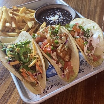Pacific Catch - Spicy Steak Taco, Crispy Baja Shrimp Taco, and Grilled Shrimp Taco with fries and black beans - Sushi Bars Near Me - Santa Clara, California Pacific Catch - Spicy Steak Taco, Crispy Baja Shrimp Taco, and Grilled Shrimp Taco with fries and black beans - Sushi Bars Near Me - Santa Clara, California