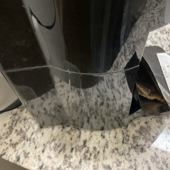 Quality Inn - Someone put coffee pod in wrapped, housekeepers put back on tray to be used again. - Hotels Near Me - Morganton, North Carolina