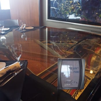 Space Needle - Waiting area, really cool piano table! - Landmarks & Historical Buildings Near Me - Seattle, Washington Space Needle - Waiting area, really cool piano table! - Landmarks & Historical Buildings Near Me - Seattle, Washington
