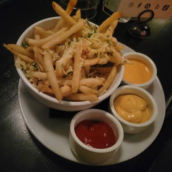 Dutch Freds - Parmasean truffle fries with sweet potato fries sauce - Cocktail Bars Near Me - New York, New York Dutch Freds - Parmasean truffle fries with sweet potato fries sauce - Cocktail Bars Near Me - New York, New York