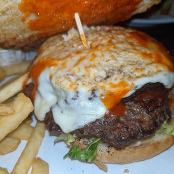 The Admiral - The Wolf of Waterloo (beef burger, haggis, chorizo, mozzarella & chili sauce) - Pubs Near Me - Glasgow, GLG