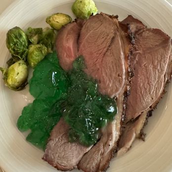 The Biltmore Brunch - The carved lamb with mint jelly and a small side of brussel sprouts. - Breakfast & Brunch Near Me - Coral Gables, Florida The Biltmore Brunch - The carved lamb with mint jelly and a small side of brussel sprouts. - Breakfast & Brunch Near Me - Coral Gables, Florida