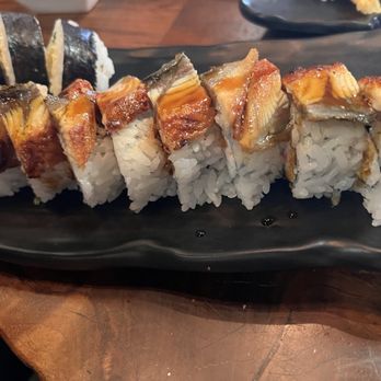 Arigato Sushi - red dragon (doesn't match the picture in the menu). There's supposed to be spicy tuna & shrimp but I'm pretty sure that's eel on top. - Sushi Bars Near Me - Gold River, California Arigato Sushi - red dragon (doesn't match the picture in the menu). There's supposed to be spicy tuna & shrimp but I'm pretty sure that's eel on top. - Sushi Bars Near Me - Gold River, California