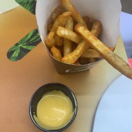 This is what they give you for a large nacho fry, not even half the container is filled with cheese. This is what they give you for a large nacho fry, not even half the container is filled with cheese.