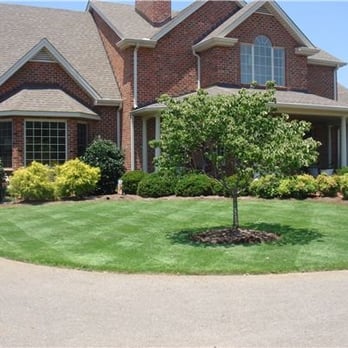 TruGreen Lawn Care - the front of a large brick home - Tree Services Near Me - Belgrade, Montana TruGreen Lawn Care - the front of a large brick home - Tree Services Near Me - Belgrade, Montana