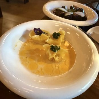 Fortu - lobster dumplings, and pork belly in the background - Wine Bars Near Me - St. Petersburg, Florida Fortu - lobster dumplings, and pork belly in the background - Wine Bars Near Me - St. Petersburg, Florida