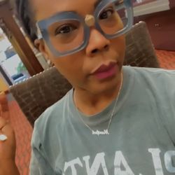 Eye & Eye Optics - Me trying on some funky frames