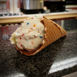 Cream - Birthday cake batter ice cream in one of our in-house made waffle cones!