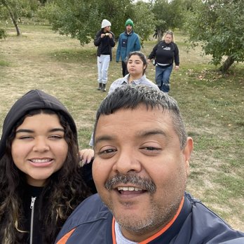 Allen's Orchard - a man and a woman taking a selfie - Fruits & Veggies Near Me - Marion, Iowa