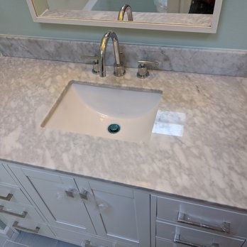 Yeshua's Remodeling - Not standard vanity space so they have to cut the countertop to fit - General Contractors Near Me Yeshua's Remodeling - Not standard vanity space so they have to cut the countertop to fit - General Contractors Near Me