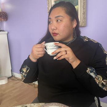 The Purple Door Tea Room - Me trying to pose to look candid. - Tea Rooms Near Me - Ferndale, Michigan