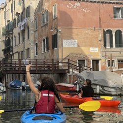 Real Venetian Kayak - Anna in the orange kayak and Andrea in the blue kayak