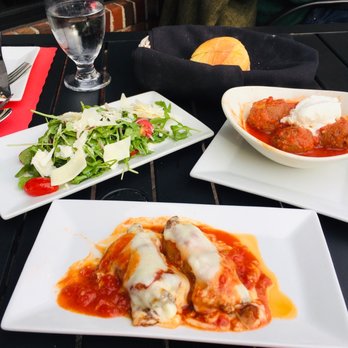 Mezza Luna Bistro - a plate of lasagna and a bowl of salad - Italian Near Me - Allendale, New Jersey