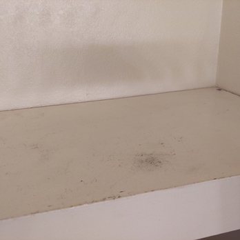 Rodeway Inn Fallbrook Downtown - That's literally dirt and dust on the closet shelf. - Hotels Near Me - Fallbrook, California