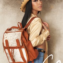 Cowhide Outlet - Backpack hidden pockets
 available at store hardwood rd. Bedford