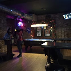 The Pioneer Tap - Billiards table, tvs, two dart stations, and cheap drinks.