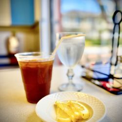 Fresh brewed unsweetened iced tea with fresh lemon. Excellent. Winners circle OuiOui.