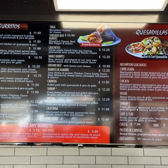 Oscar's Taco Shop - A digital menu board at Oscar's Taco Shop in Phoenix lists burritos, quesadillas, and other Mexican food options with prices. - Mexican Near Me - Phoenix, Arizona