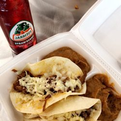 Chava's Mexican Grill - Beef, steak, and chicken tacos with refried beans