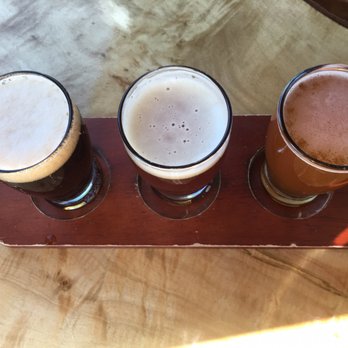 Chimney Rock Brewing - Beautiful wood tables and chairs - Breweries Near Me - Chimney Rock, North Carolina